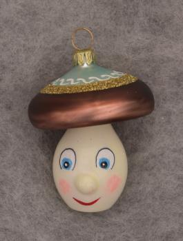 Pilz mit Gesicht türkis braun